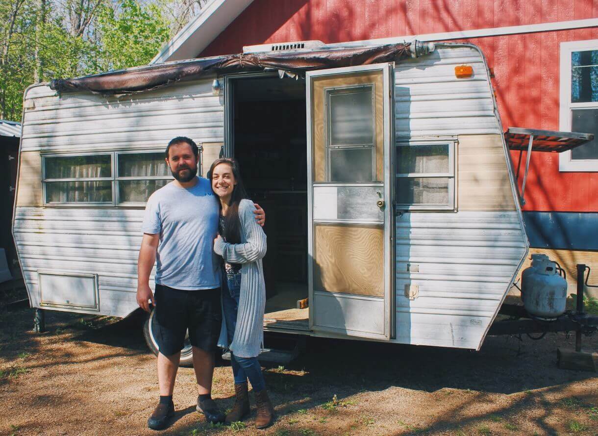 Coy and Cristiana with the Cozy Camper before renovating